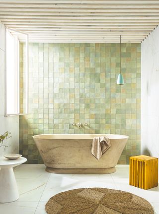 Bathroom with freestanding tub and zellige tiles