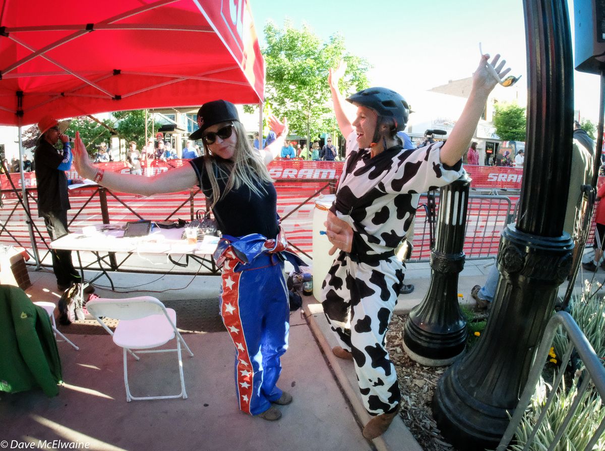 One of the race announcers took a break from the action to dance with someone in a cow costume