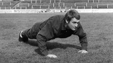 Rodney marsh doing push-ups in the 1960s