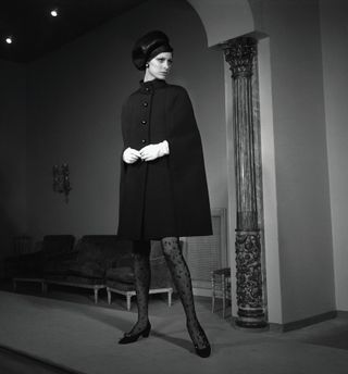 60s fashion - black cape