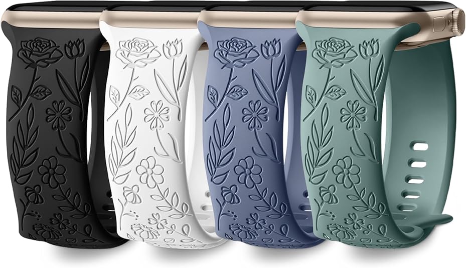4 floral-patterned Apple Watch bands on a white background, one black, one white, one blue and one green.
