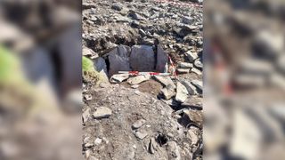 The newly discovered tomb, seen here from the south-west, was unearthed when workmen using a mechanical digger overturned a large slab above it.