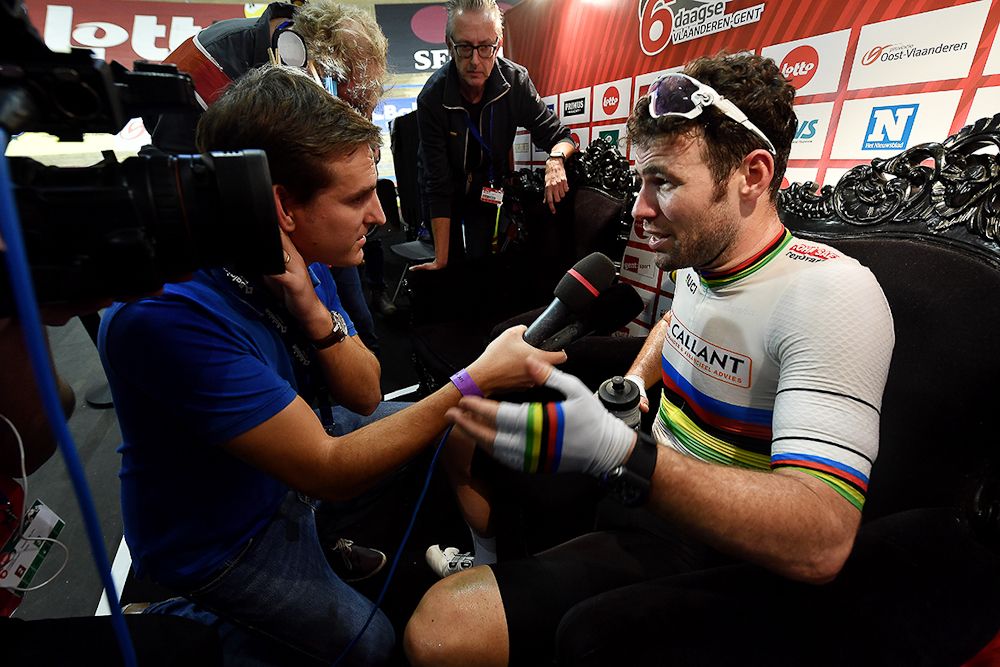 Mark Cavendish talks to a reporter at the Gent Six Day