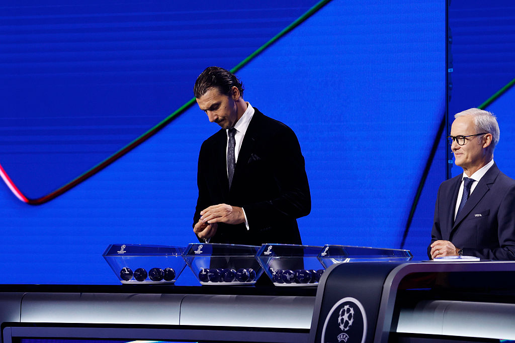 Zlatan Ibrahimovic selects a ball for the Champions League league phase draw in 2025