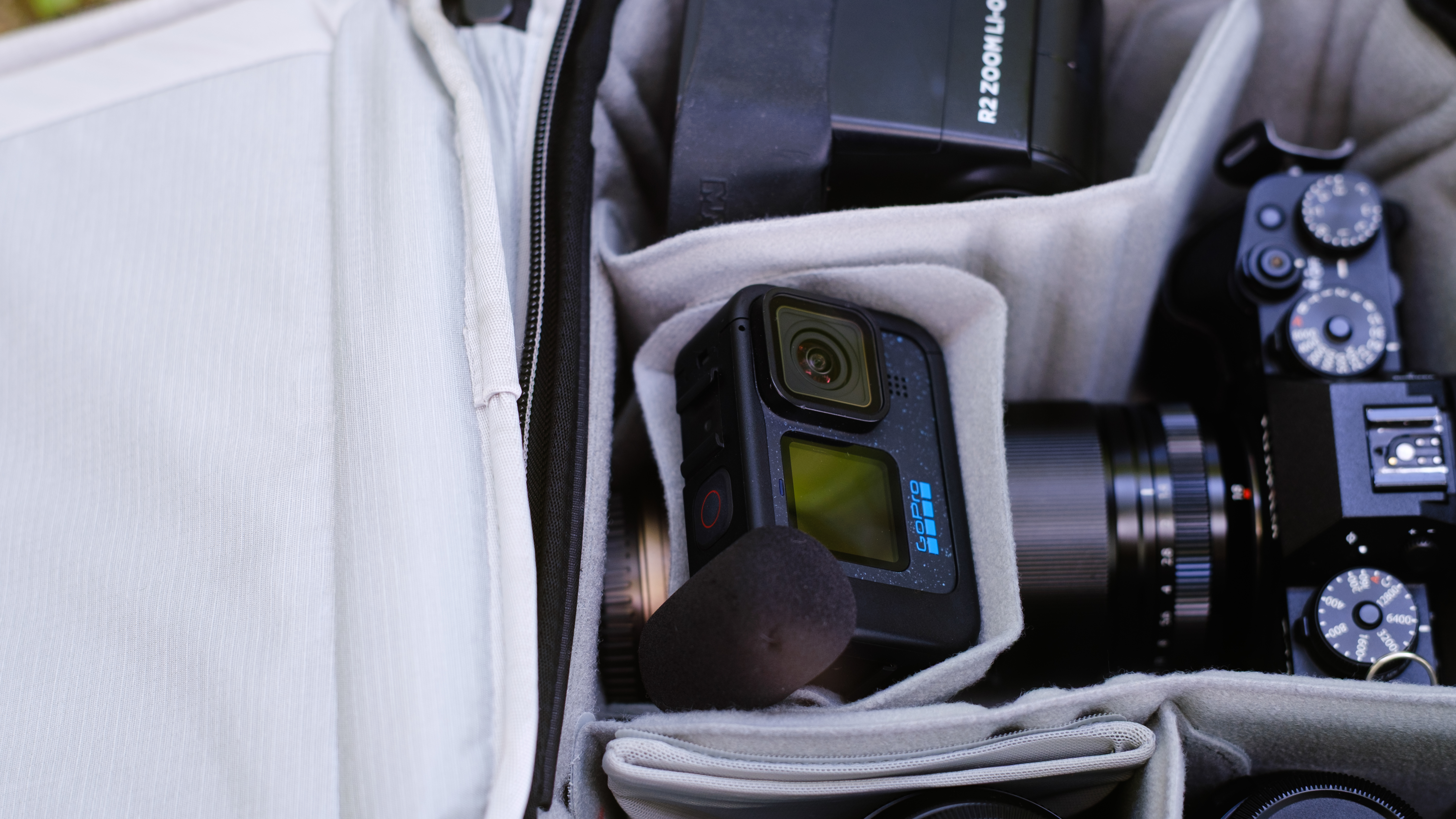 The Peak Design Travel Backpack 20L in use by a photographer