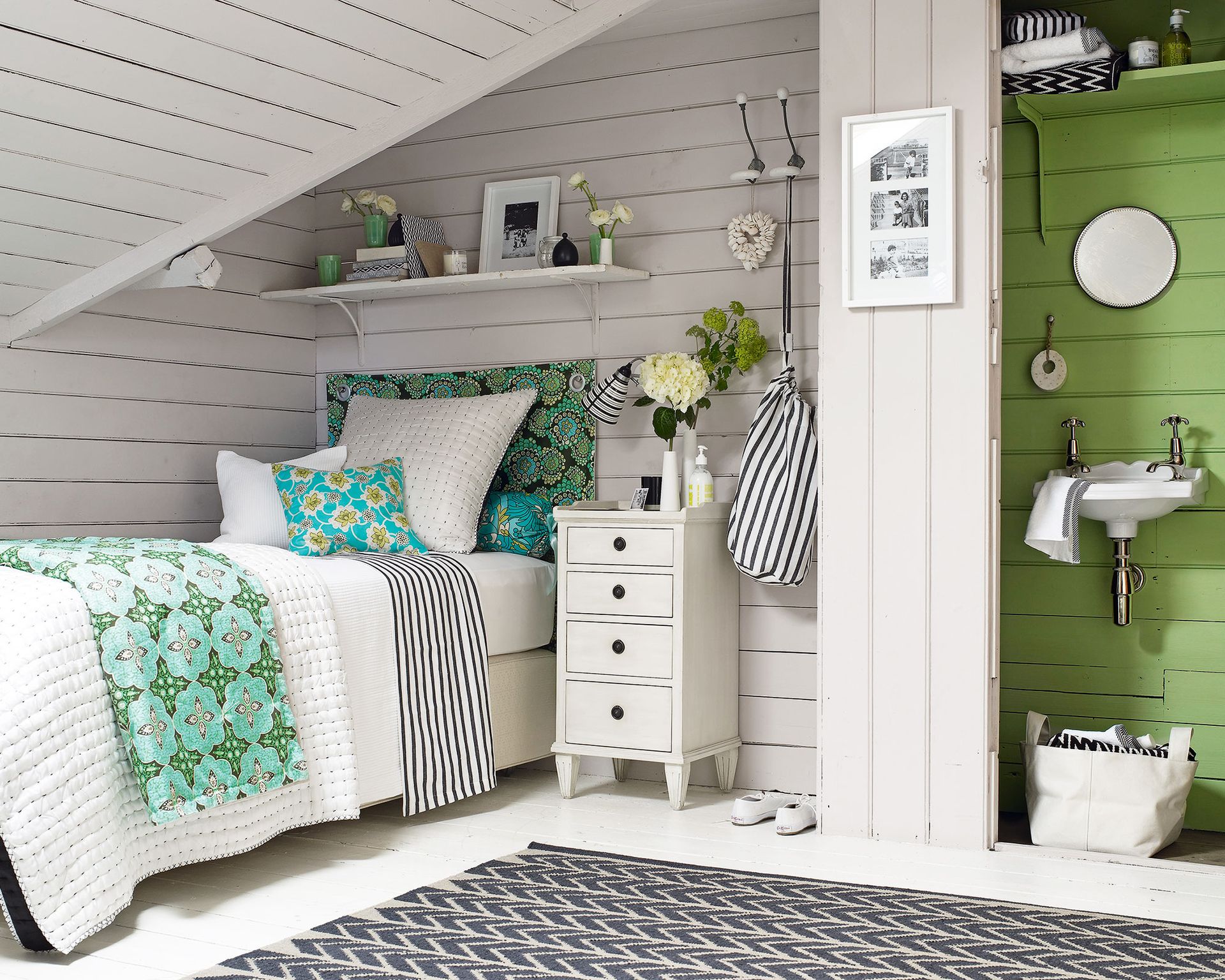 Small bedroom ideas with a single bed in a wood panelled loft.