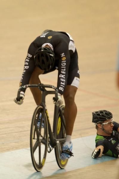 Adam Duvendeck (Momentum) is taken down by Giddeon Massie (Bike Religion) in the second gold medal ride.