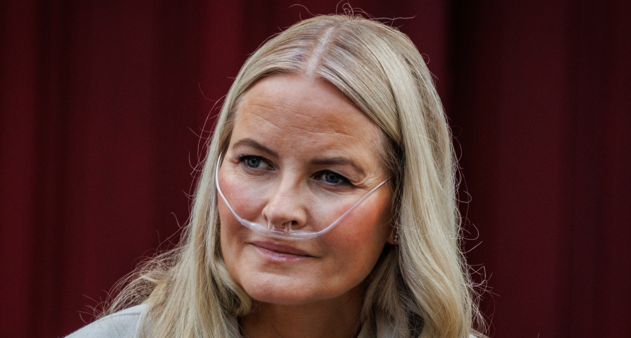 Crown Princess Mette-Marit wearing an oxygen tube