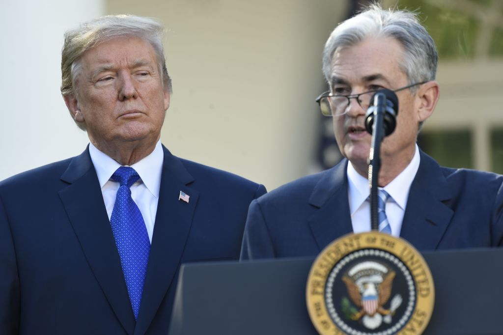 Federal Reserve Chair Jerome Powell and US President Donald Trump standing in front of White House podium on November 2, 2017