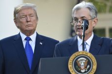 Federal Reserve Chair Jerome Powell and US President Donald Trump standing in front of White House podium on November 2, 2017