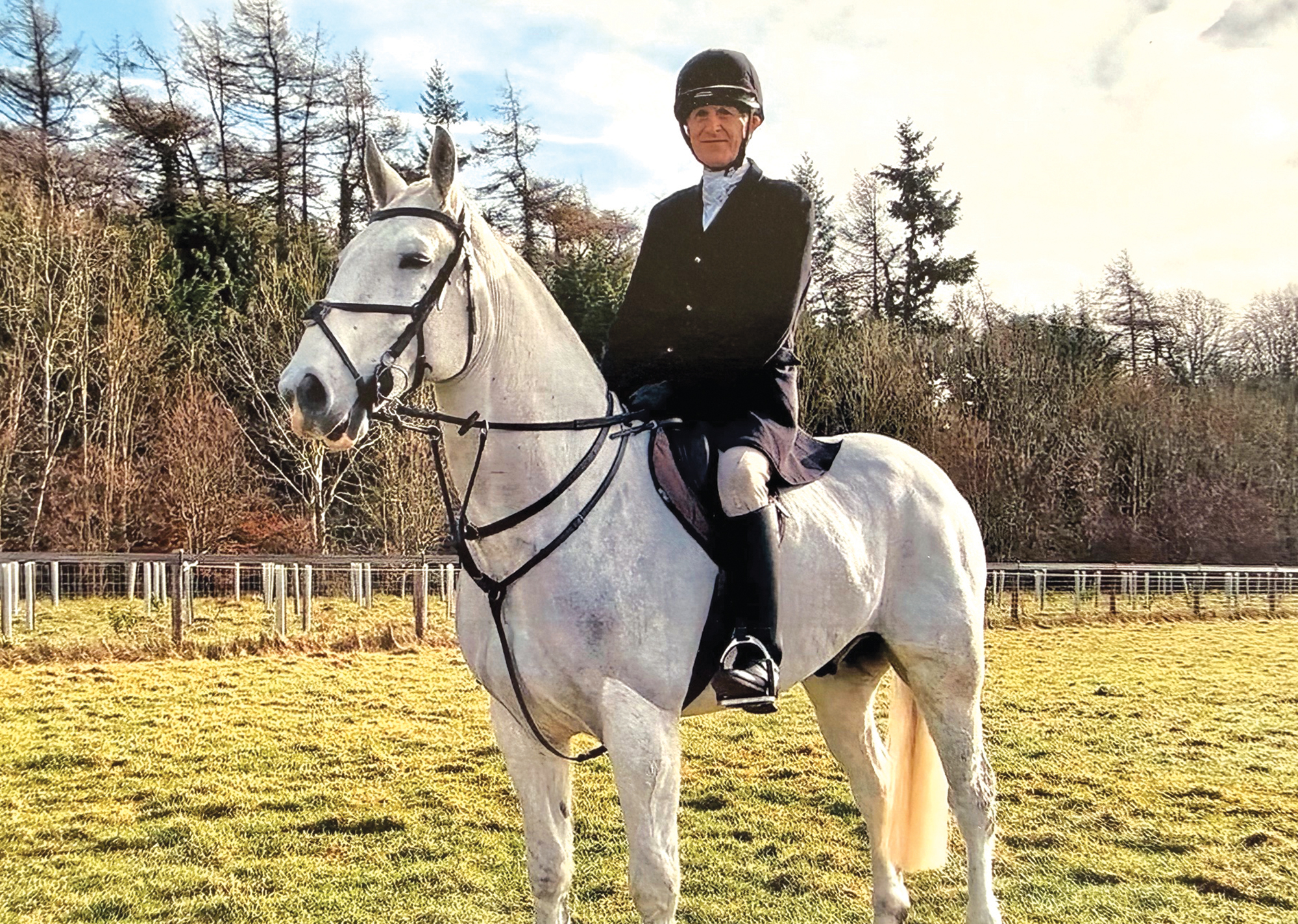 Jonathan Hull at a trail hunting meet riding a grey hunter called Con