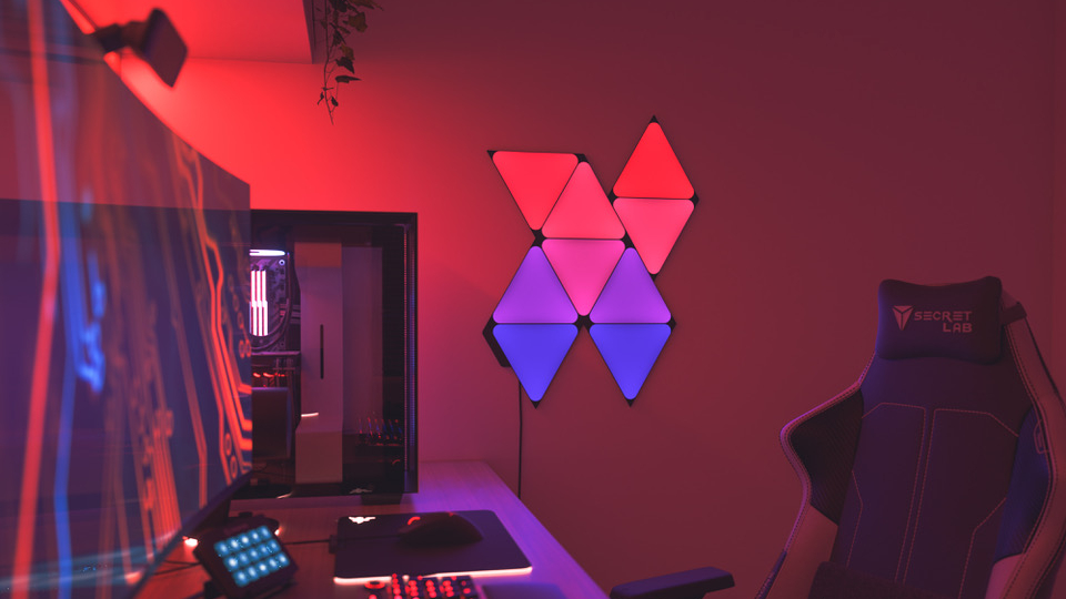 Nanoleaf Ultra Black Shapes sidder på væggen hos en gamer