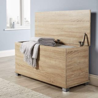 A storage box/blanket box for a bedroom