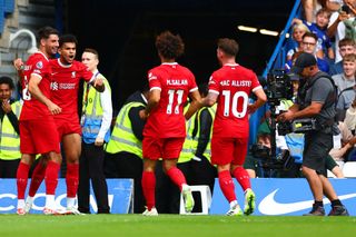 Liverpool vs Bournemouth live stream Luis Diaz of Liverpool is congratulated by his team-mates after scoring the opening goal during the Premier League match between Chelsea FC and Liverpool FC at Stamford Bridge on August 13, 2023 in London, England. (Photo by Chris Brunskill/Fantasista/Getty Images)
