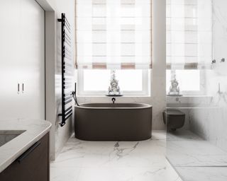 a bathroom with hidden storage behind tiles