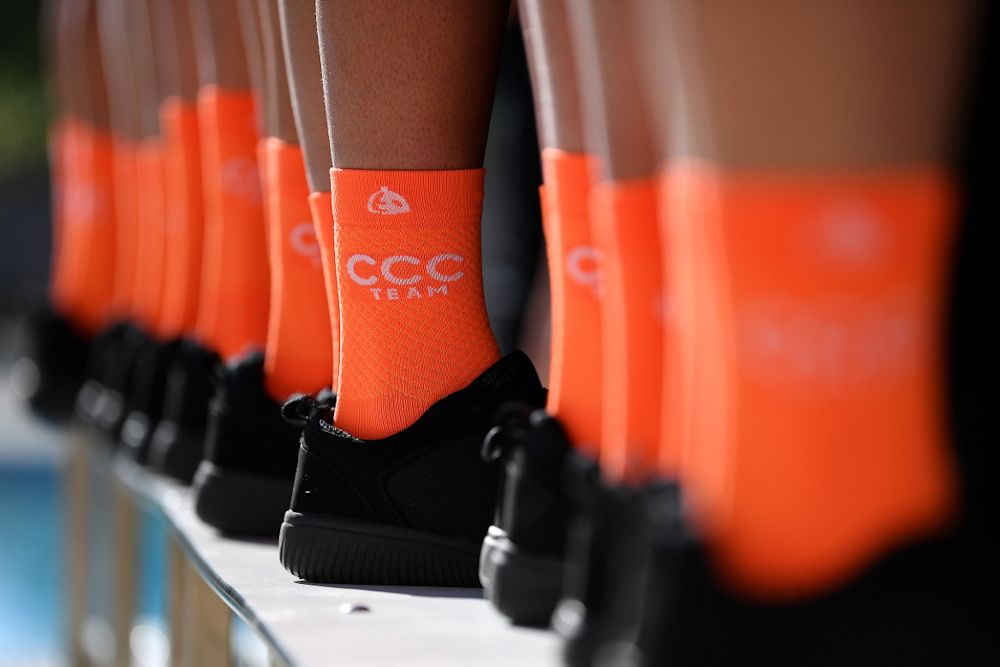 The CCC team's casual footwear is equally as orange