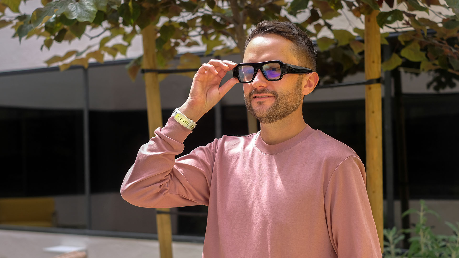A photo of a person wearing Snap Specs.