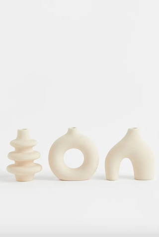 three curved shape stoneware vases