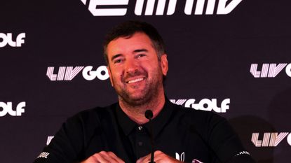 Bubba Watson speaking at LIV Golf event