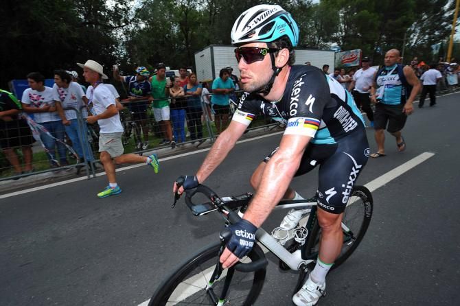 Mark Cavendish rolls past the finish line.