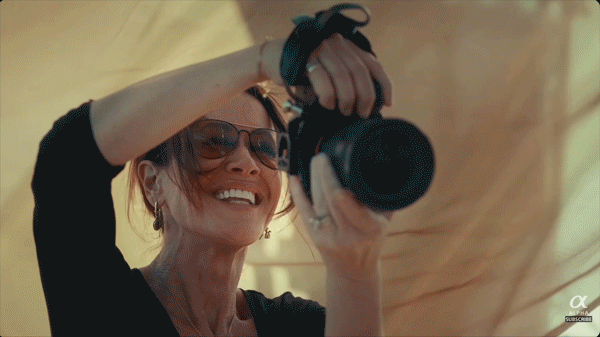 A photographer using the Sony A7R VI outdoors