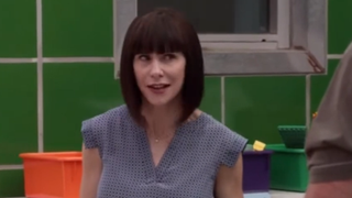 Susan Egan in Modern Family. She originated the role of Belle in Broadway's Beauty and the Beast.