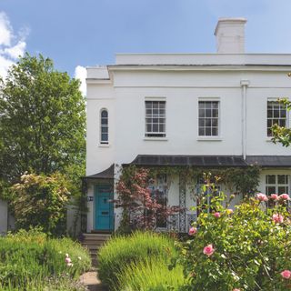 Exterior of a character property with beautiful front garden and front porch