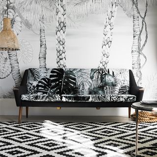 black and white floral themed living room with textured flooring