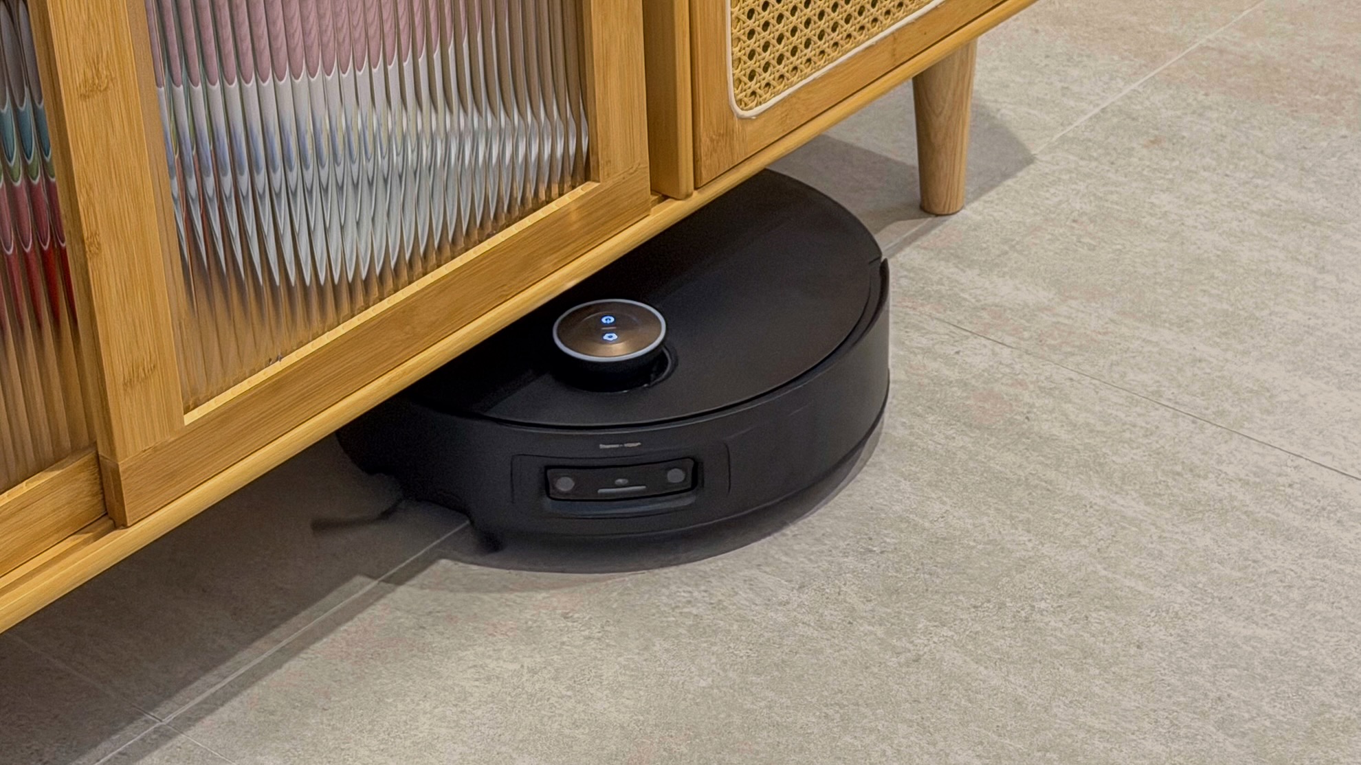 Dreame Aqua10 Ultra robot under a cabinet