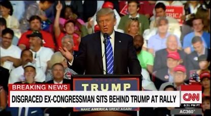 Mark Foley sits behind Donald Trump at Florida rally