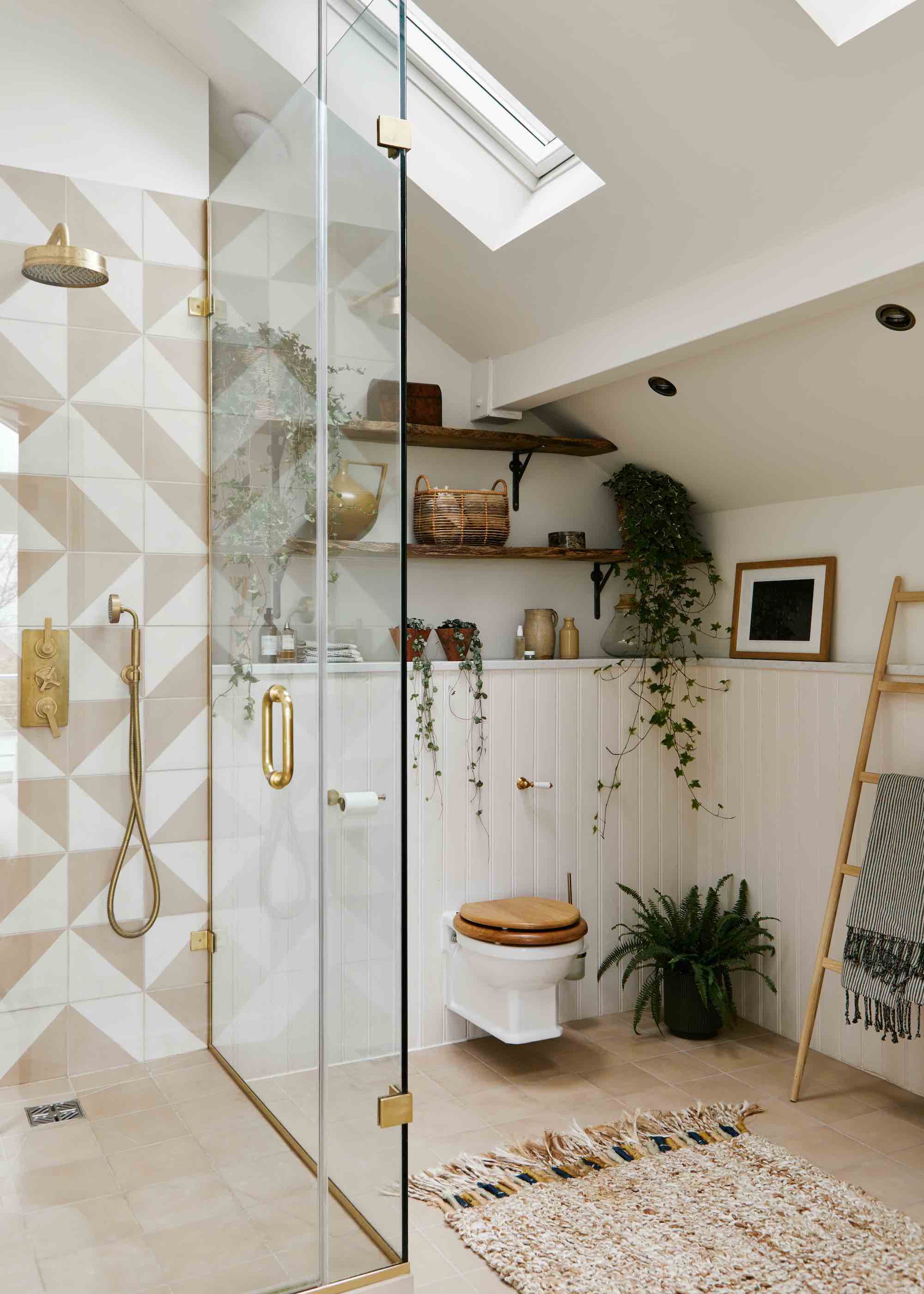 shower with neutral colours and graphic tiles on the walls of the shower