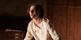 Paul Atreides (Timothee Chalamet) sits on the floor and stares ahead of himself in a scene from 'Dune'