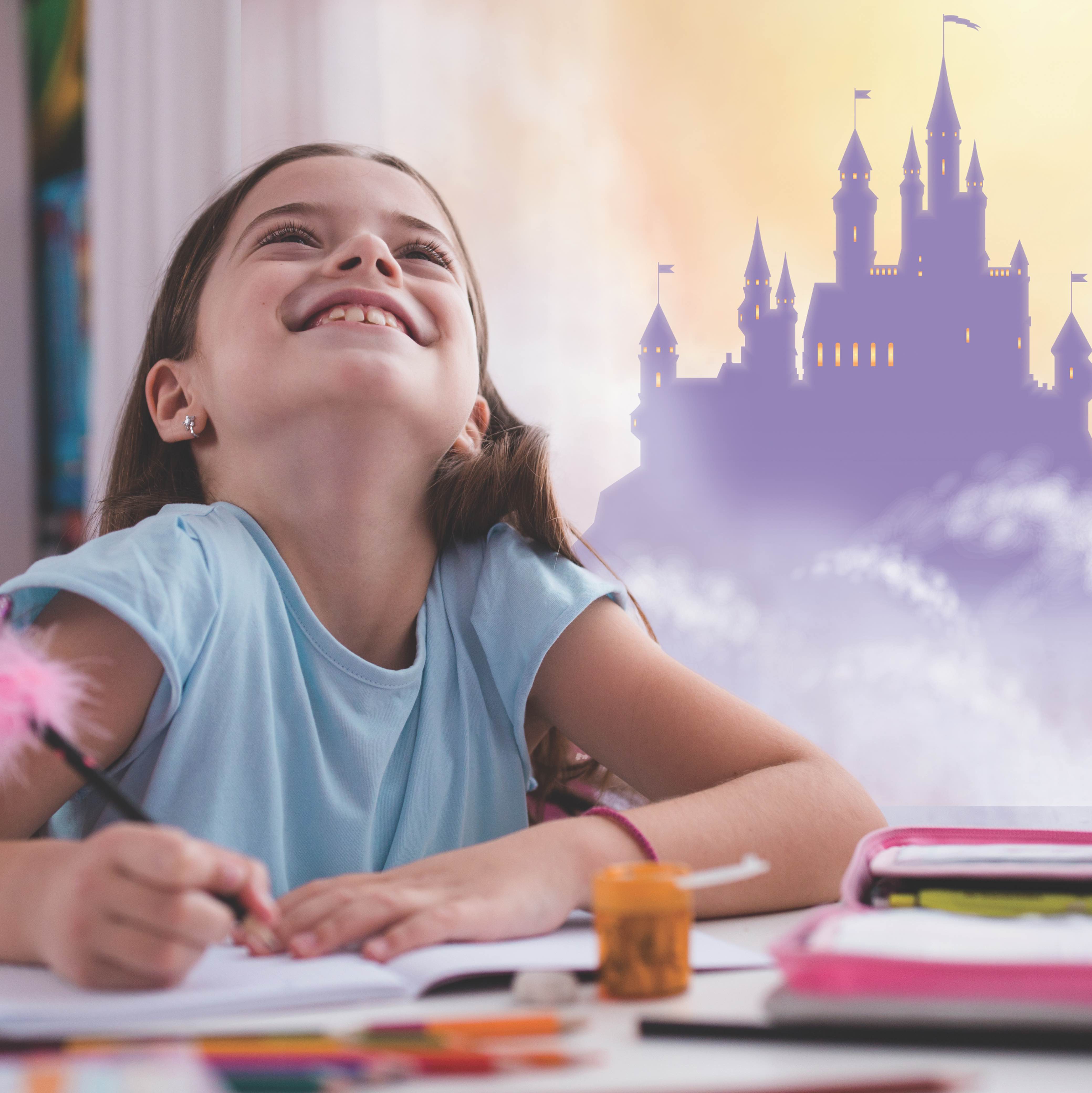 Girl writing and imagining a world of fantasy