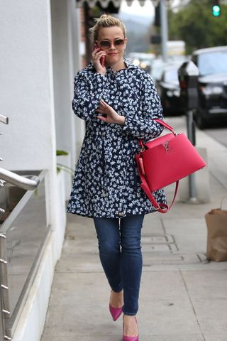 Reese Witherspoon carrying a Louis Vuitton bag
