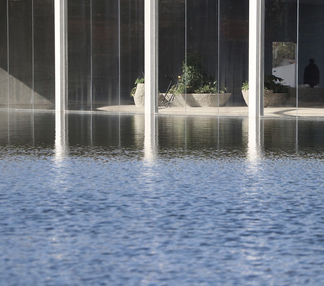 close up of water museum where the building meets the water