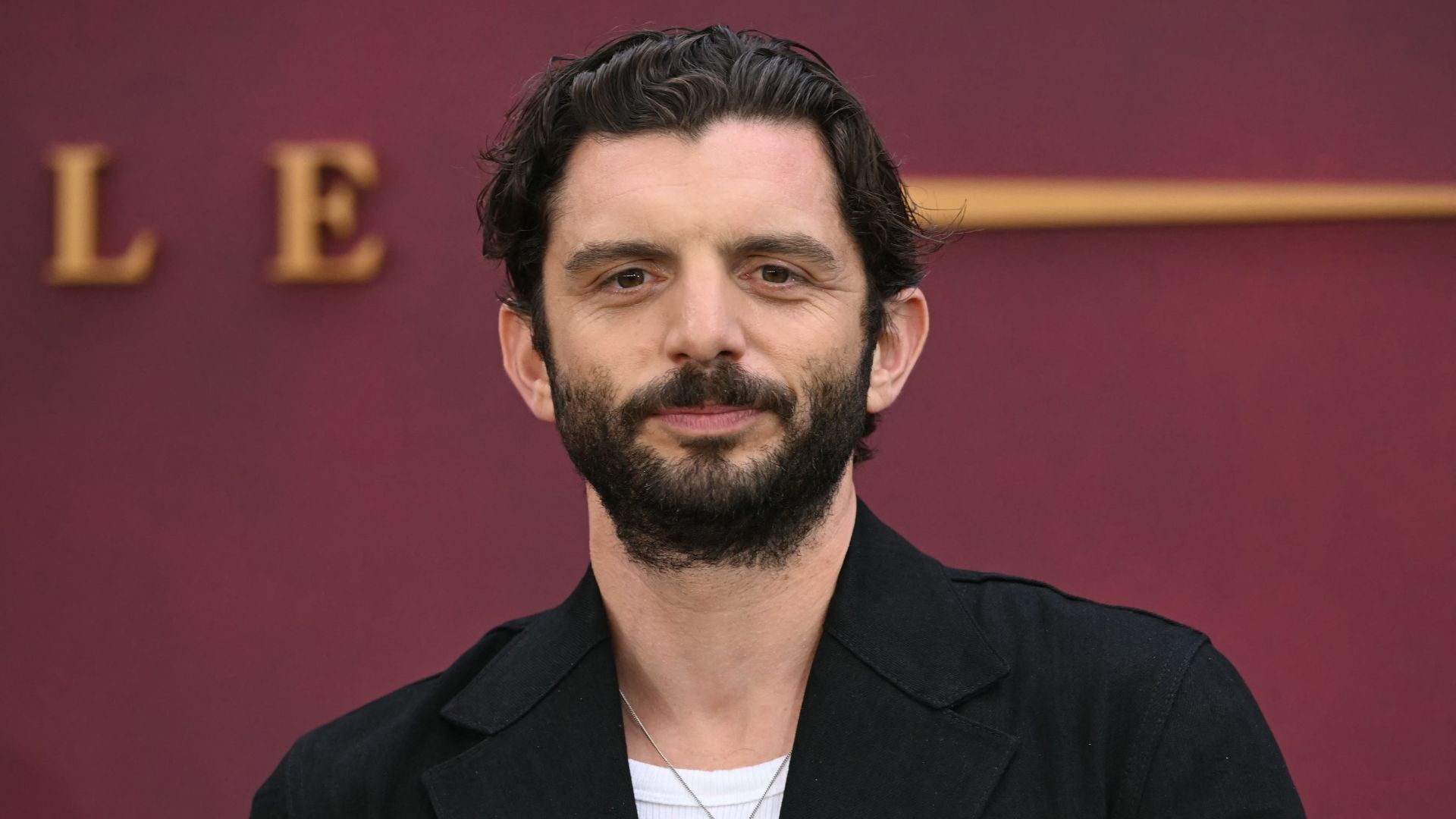 Michael C Fox poses on the red carpet upon arrival for the world premiere of the film "Downton Abbey: The Grand Finale" in London on September 3, 2025