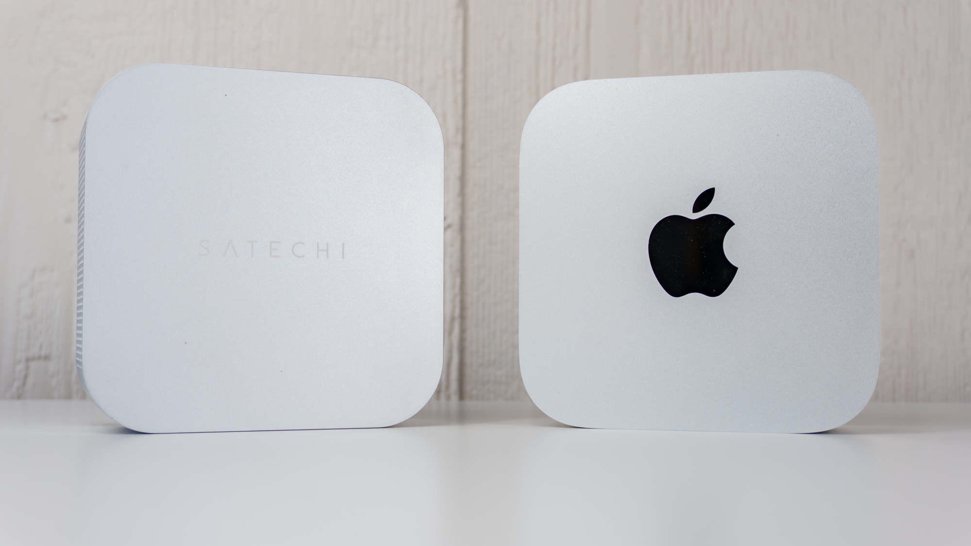 The Satechi Thunderbolt 5 CubeDock on the left next to an Apple Mac mini M4 on the right