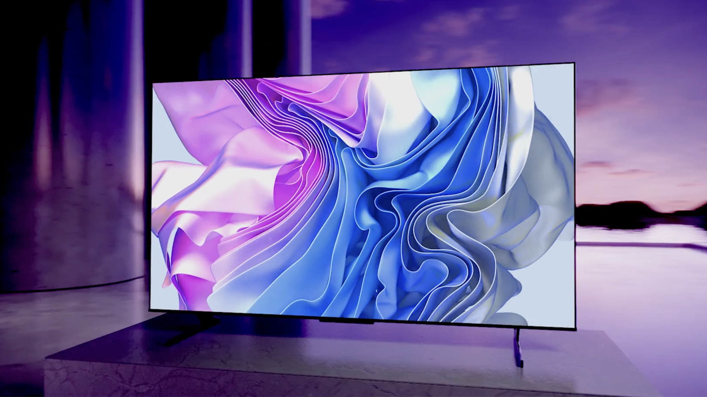The Hisense U8H TV displaying abstract pink and blue patterns
