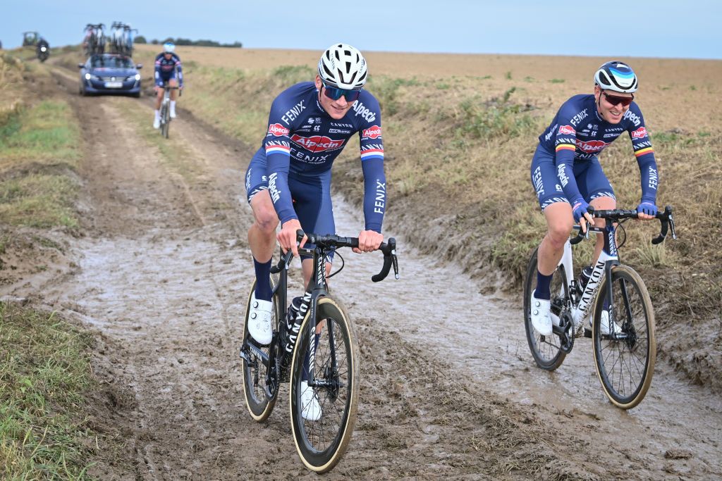 Dutch Mathieu van der Poel of AlpecinFenix and Belgian Tim Merlier of AlpecinFenix pictured in action during a training session ahead of the 118th edition of the ParisRoubaix one day cycling race from Compiegne near Paris to Roubaix Thursday 30 September 2021 Due to the ongoing corona virus pandemic the 2020 edition was cancelled and the 2021 edition was postponed from spring to autumn For the first time there will be a womens race ParisRoubaix as well BELGA PHOTO DAVID STOCKMAN Photo by DAVID STOCKMANBELGA MAGAFP via Getty Images