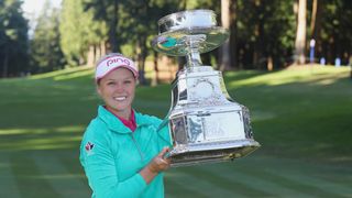 Brooke Henderson with the trophy after winning the 2016 Women's PGA Championship at Sahalee Country Club
