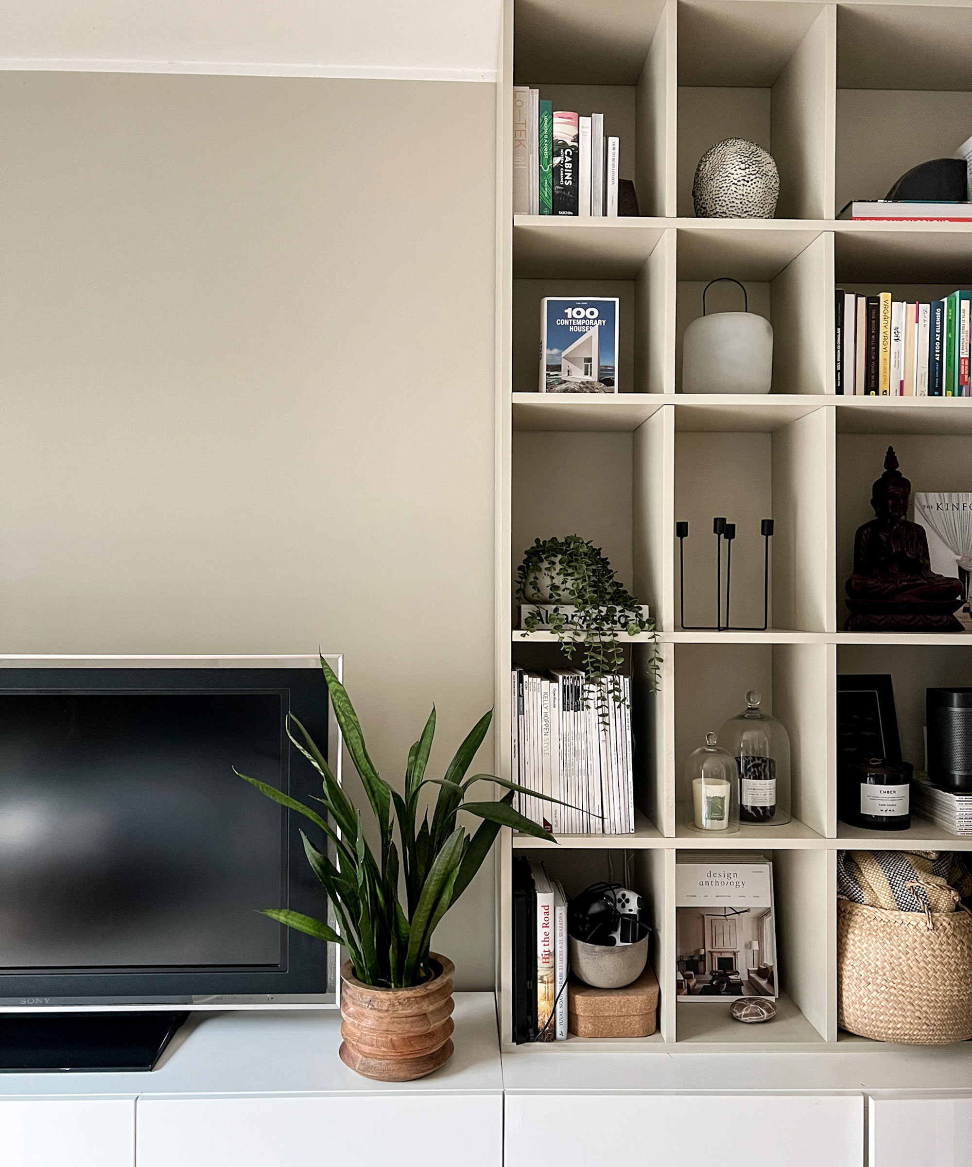 living room wall with bespoke box shelving in neutral colours