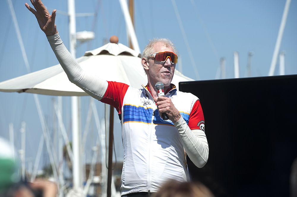 An announcer speaks to the attendees