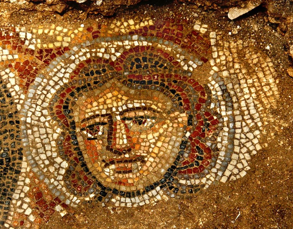 Mosaic face in synagogue.