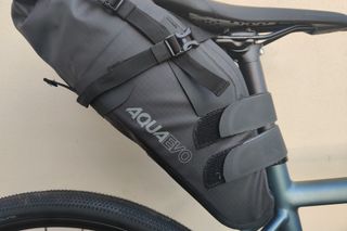 Image shows the Oxford Aqua Evo Adventure Seat Pack mounted on a bike