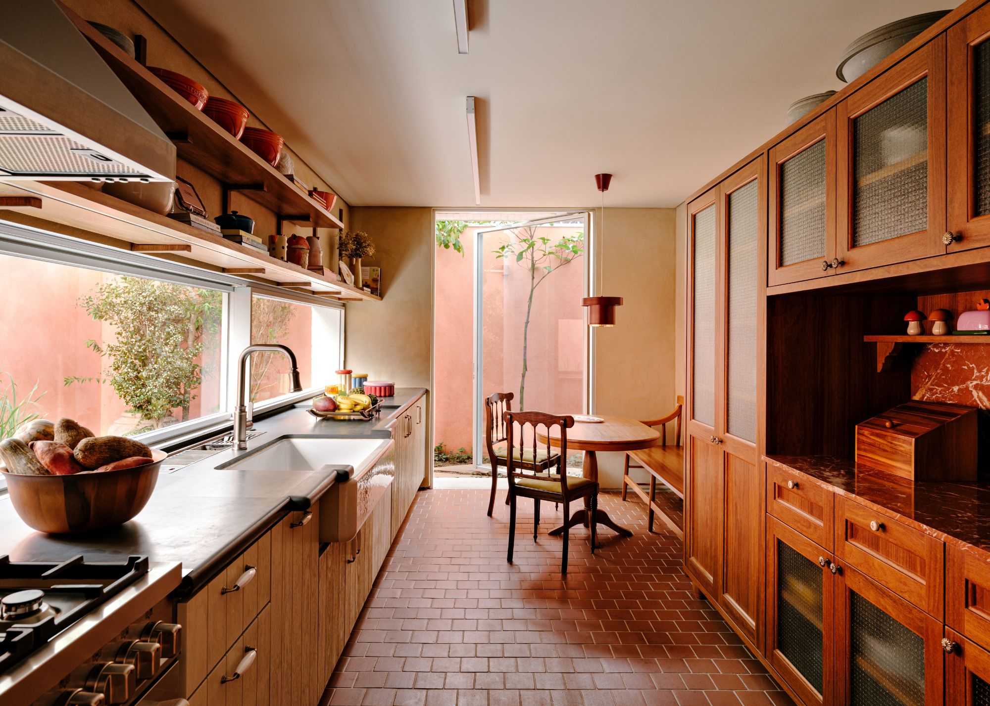 A galley kitchen drenched in earth tones