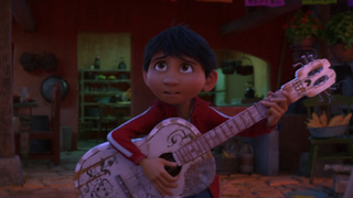 Miguel playing guitar in Coco.