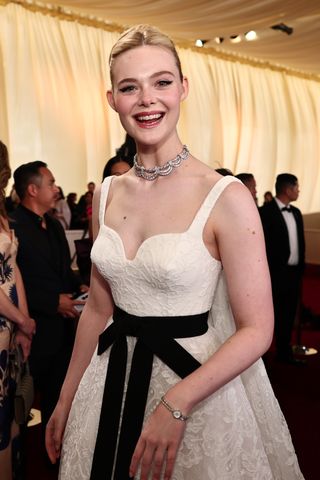 Elle Fanning wears a torque necklace to the Oscars 2025