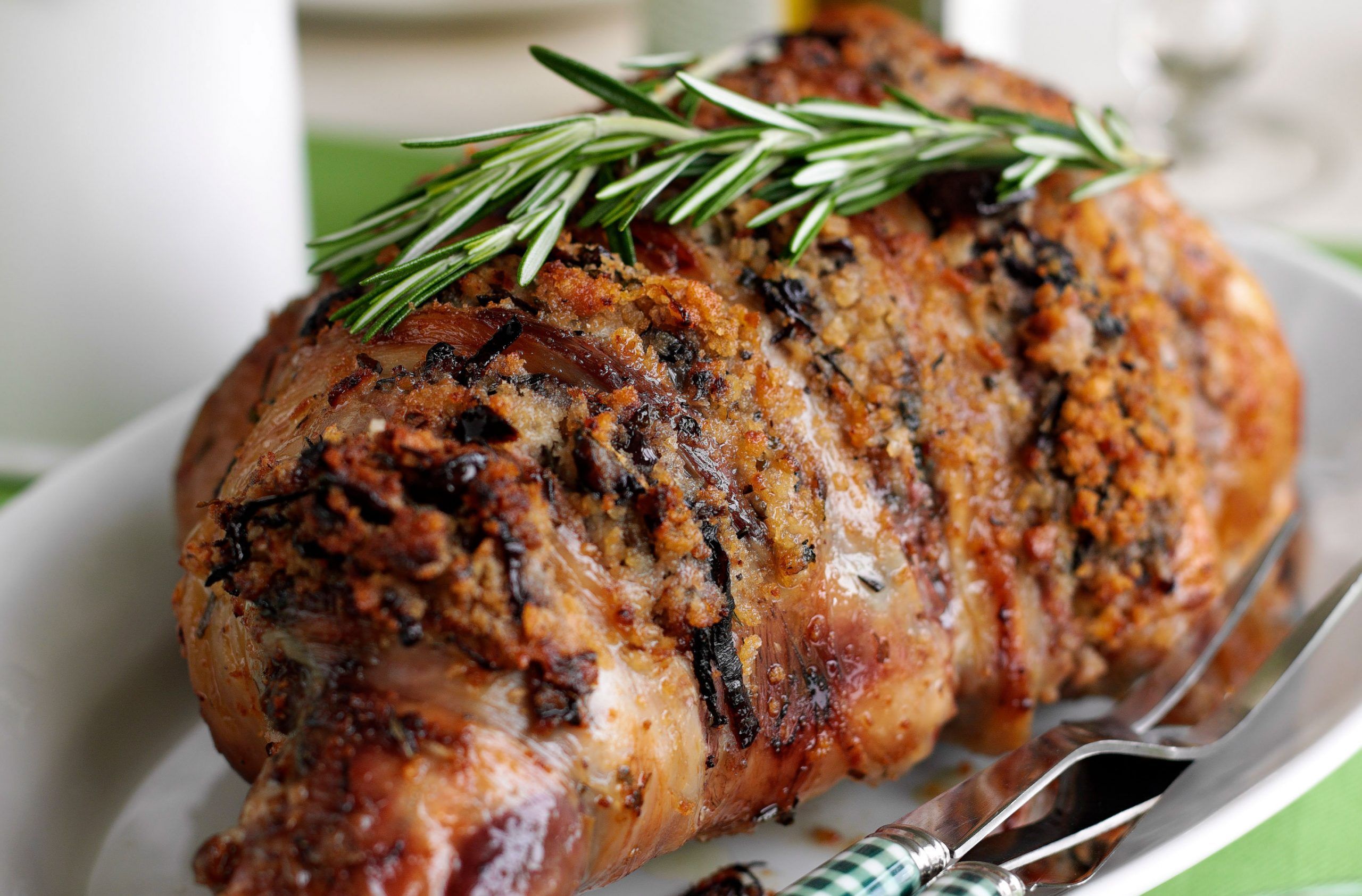 Roast leg of lamb with date and herb stuffing recipe