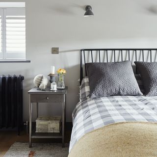 room with wooden flooring and white wall