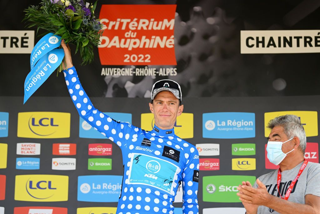 CHAINTRE FRANCE JUNE 09 Pierre Rolland of France and Team BB Hotels PB KTM celebrates winning the of Polandka Dot Mountain Jersey on the podium ceremony after the 74th Criterium du Dauphine 2022 Stage 5 a 1623km stage from ThizylesBourgs to Chaintr WorldTour Dauphin on June 09 2022 in Chaintre France Photo by Dario BelingheriGetty Images